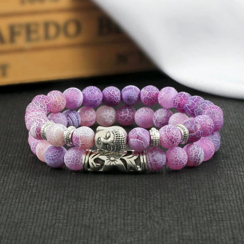 Frosted stone matte Buddhist healing bracelet with refined minimalist design and spiritual charm accent
