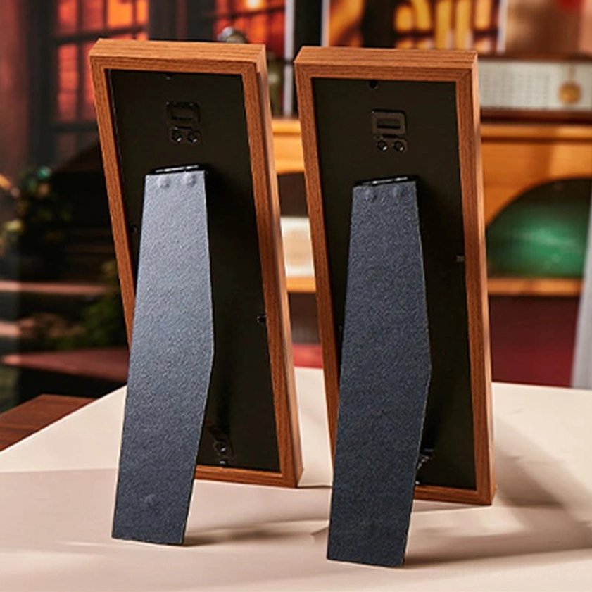 Back view of Fu character wooden frame showing foldable black display stand