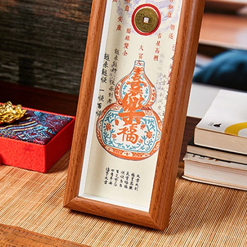 Gourd blessing wooden photo frame displayed on desk with gift box decor