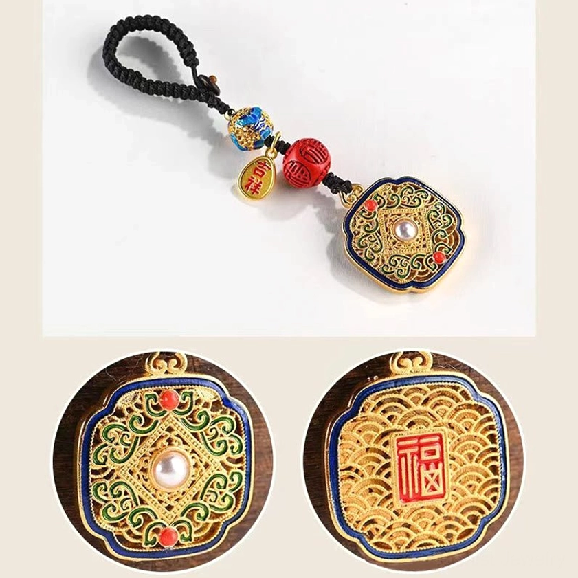 Fu character blessing keychain pendant front and back views showing green enamel filigree with pearl inlay and Fu character pattern