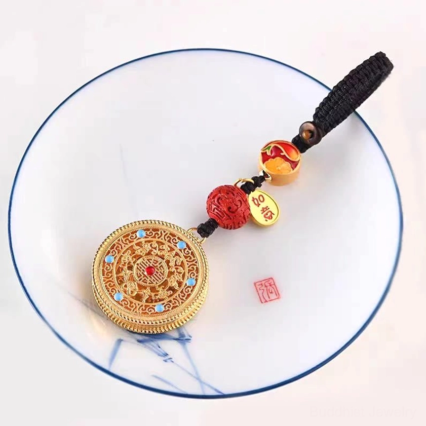 Round Fu character blessing keychain pendant with smooth enamel finish and braided cord for daily carry