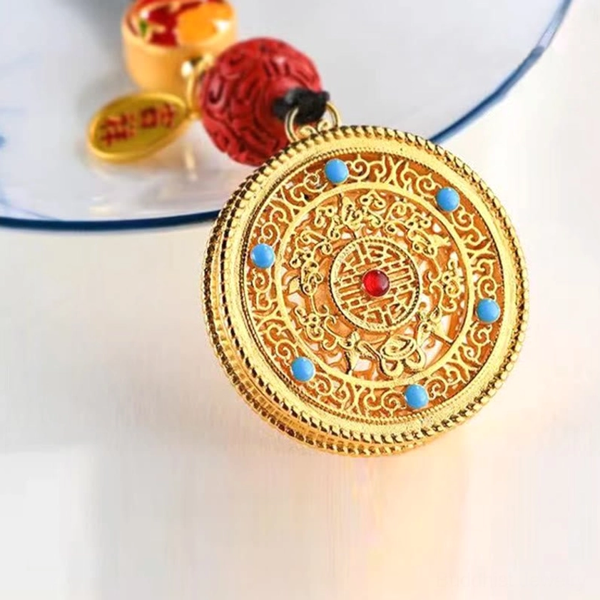 Buddhist prosperity keychain with Fu character symbol displayed as portable spiritual talisman for good fortune