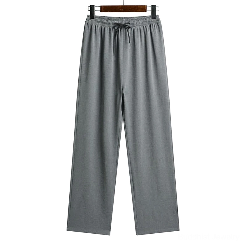 Matching dark gray Tang Suit pants with elastic waistband and traditional cut - front hanging display