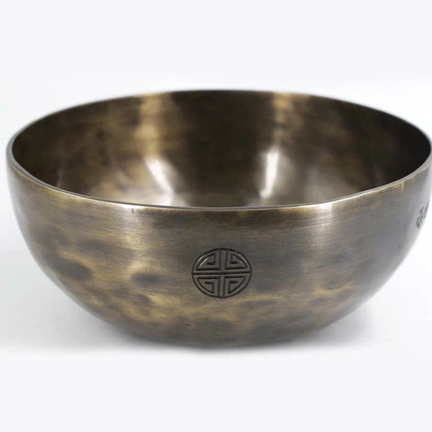 Full moon copper singing bowl front view studio display with hammered finish