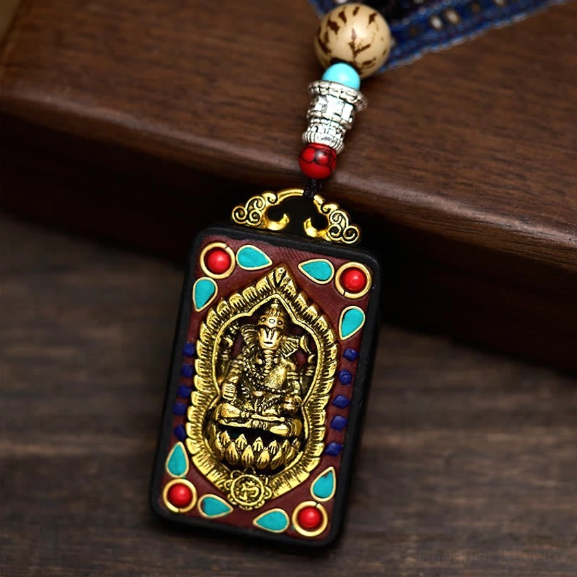 Ganesha elephant pendant necklace with turquoise inlay on premium ebony wood