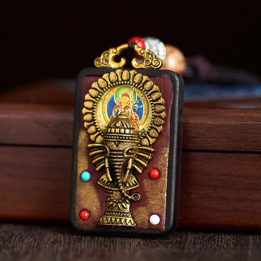 Ganesha pendant necklace showing intricate turquoise inlay and artisan craftsmanship details