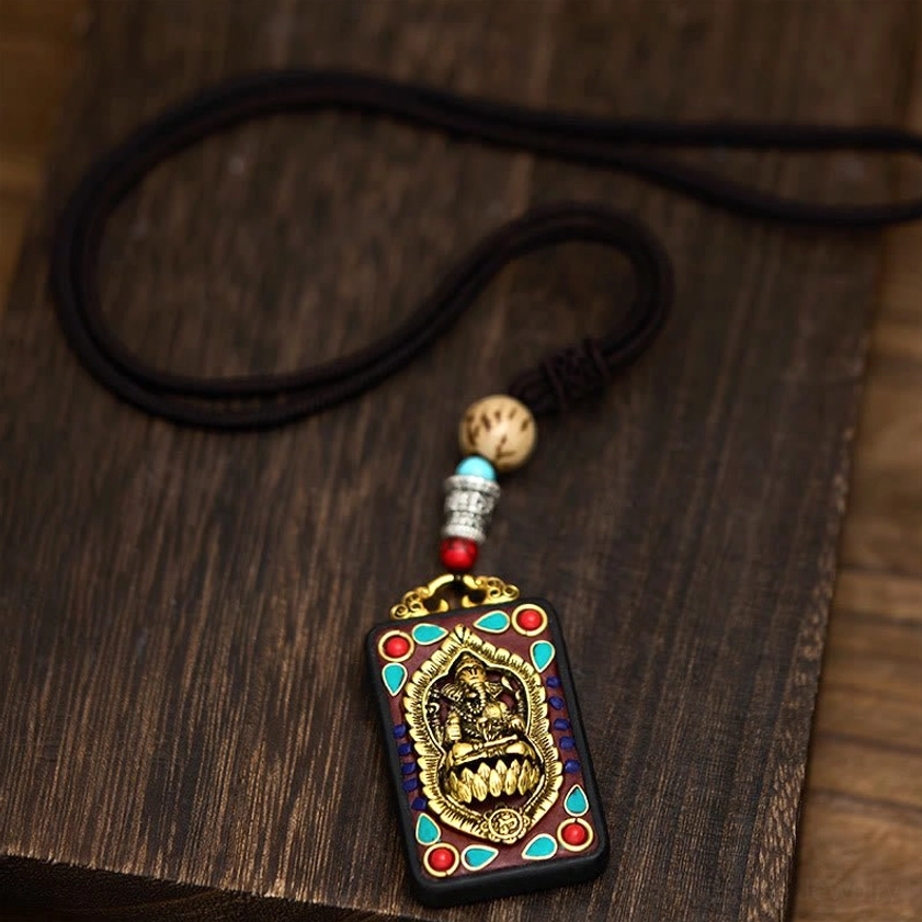Style A variant of handcrafted Ganesha wooden pendant with traditional design