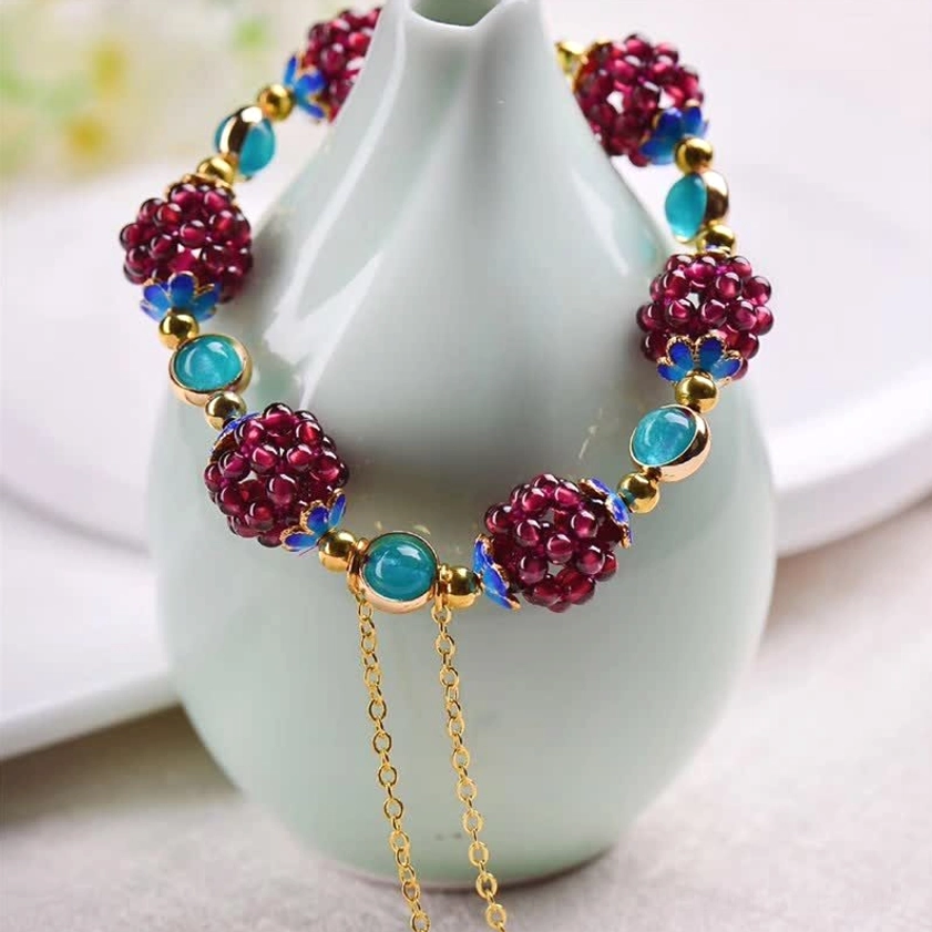 Yellow stone detail garnet amethyst Buddhist bracelet showcasing natural gemstone craftsmanship