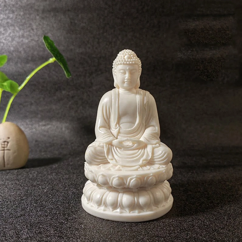 Gautama Buddha historical figure - natural ivory fruit spiritual meditation statue