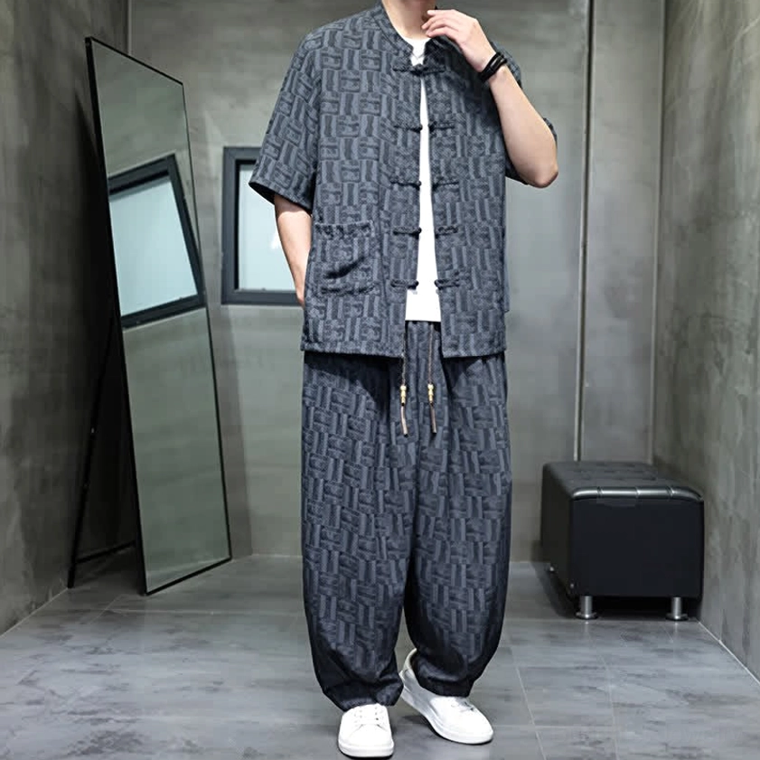 Men's geometric harem pants with undershirt - layered casual wear showing breathable fabric drape