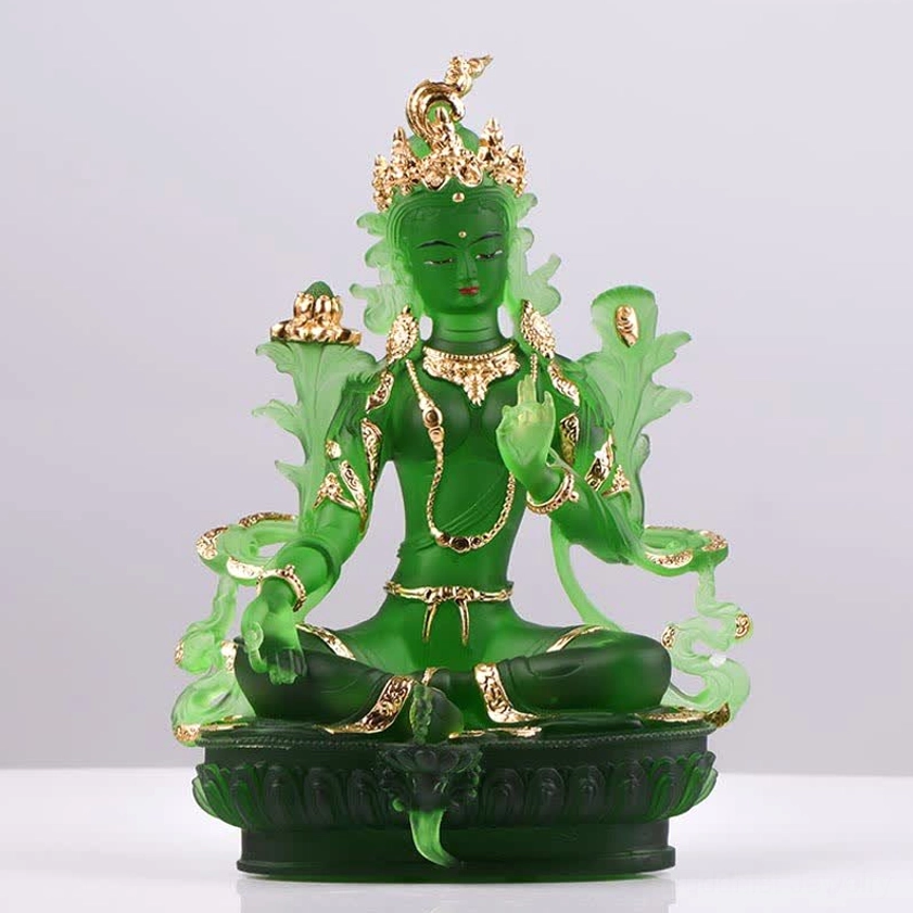Gilded Green Tara Buddha statue front view with bright background, translucent green and gold trims, detailed lotus base and floral hand adornments