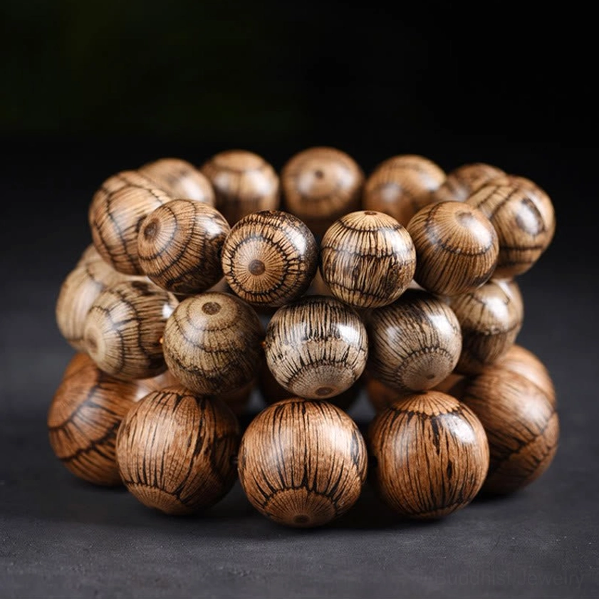 Gnetum wood beaded bracelet highlighting natural wood grain details and sustainable eco-friendly Buddhist jewelry craftsmanship