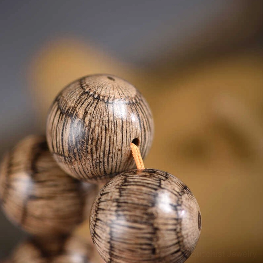 Premium handcrafted gnetum wood beads bracelet showcasing authentic Buddhist spiritual craftsmanship and natural materials