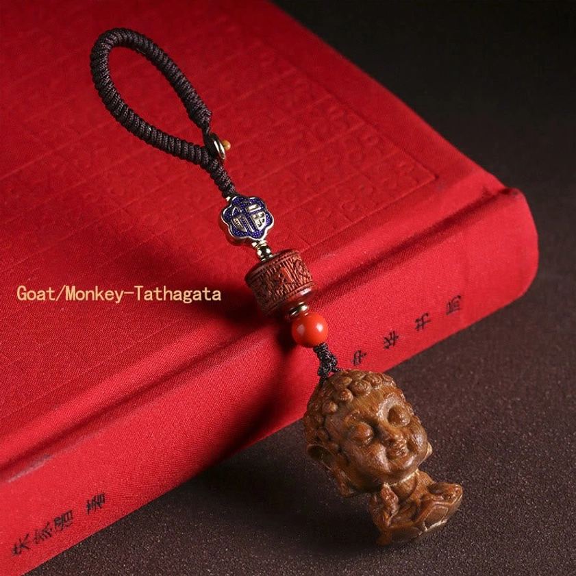 Goat and Monkey zodiac Tathagata Buddha keychain sandalwood spiritual wisdom and compassion charm