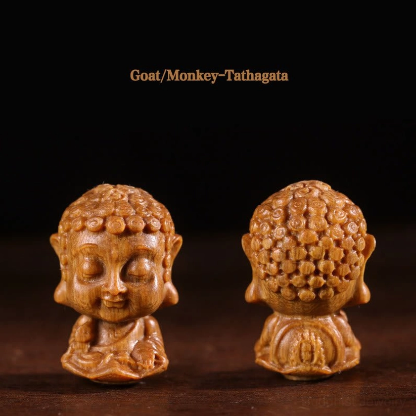 Goat and Monkey's patron Tathagata Buddha carved sandalwood figurine with calm peaceful expression and lotus base design