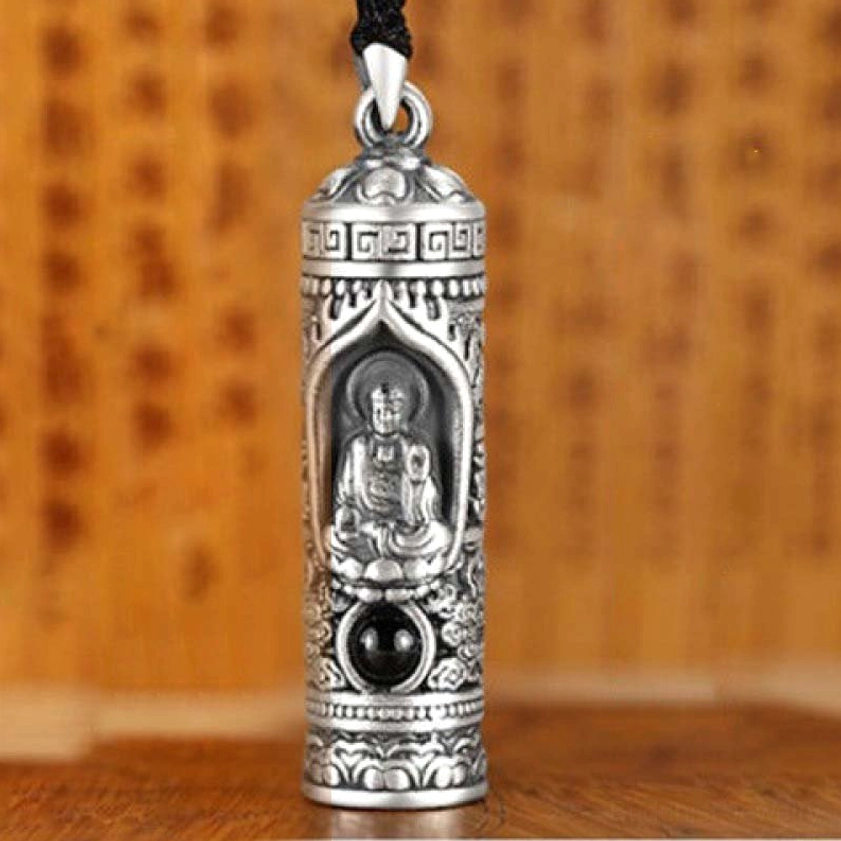 Goat monkey zodiac guardian Buddha pendant with embossed design and black inlaid stone creativity and harmony