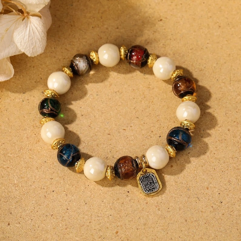 Beige porcelain with multicolored liuli glass bead Goddess of Wealth bracelet variant