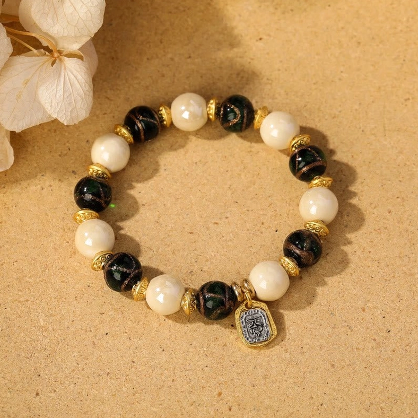 Beige porcelain with green liuli glass bead Goddess of Wealth bracelet style