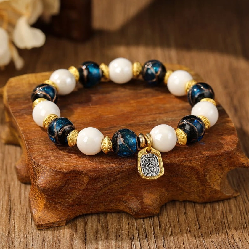 White porcelain with blue liuli glass bead Goddess of Wealth bracelet variant