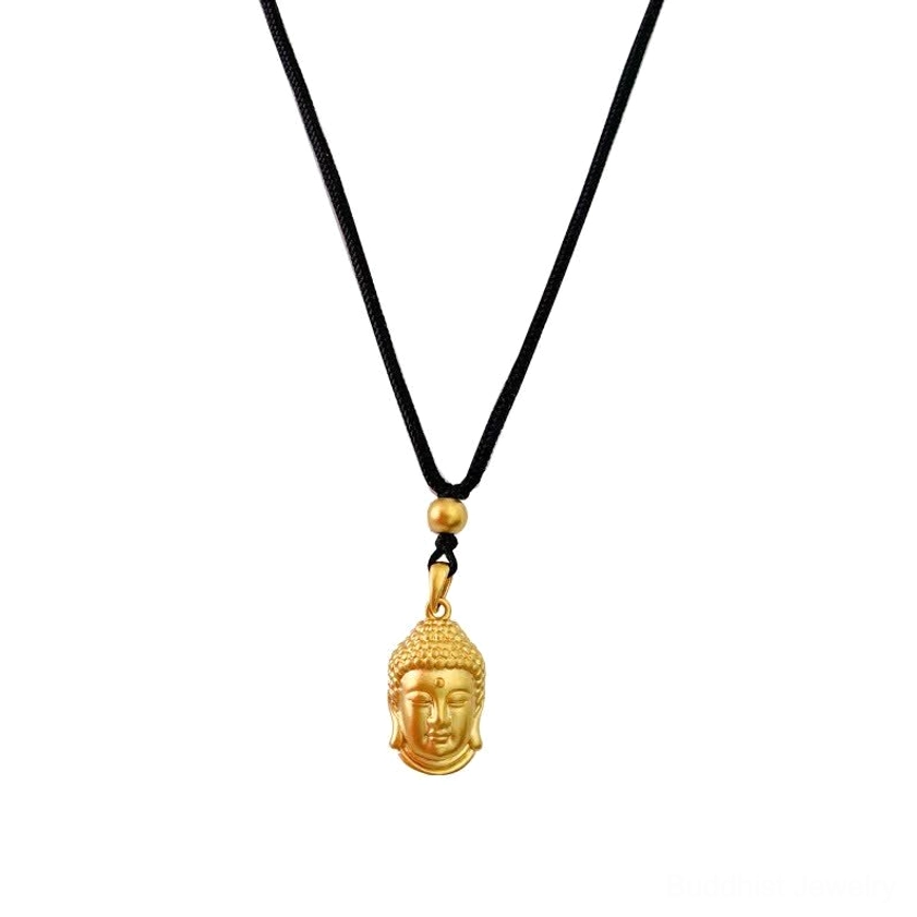Buddhist copper pendant necklace detail showing craftsmanship and golden matte finish of Buddha head charm