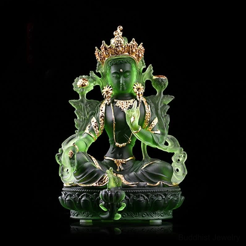 Gold-accented Green Tara Liuli crystal Buddha statue front view on dark background with ornate gold decorative accents and crown