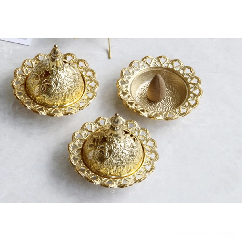 Portable gold Buddhist incense burner with decorative rim ideal for home aromatherapy and mindfulness