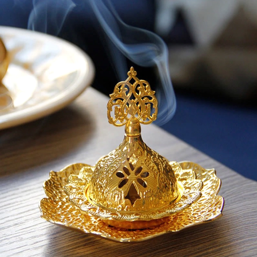 Gold lotus leaf Buddhist incense burner for meditation and spiritual practice, complete assembled view