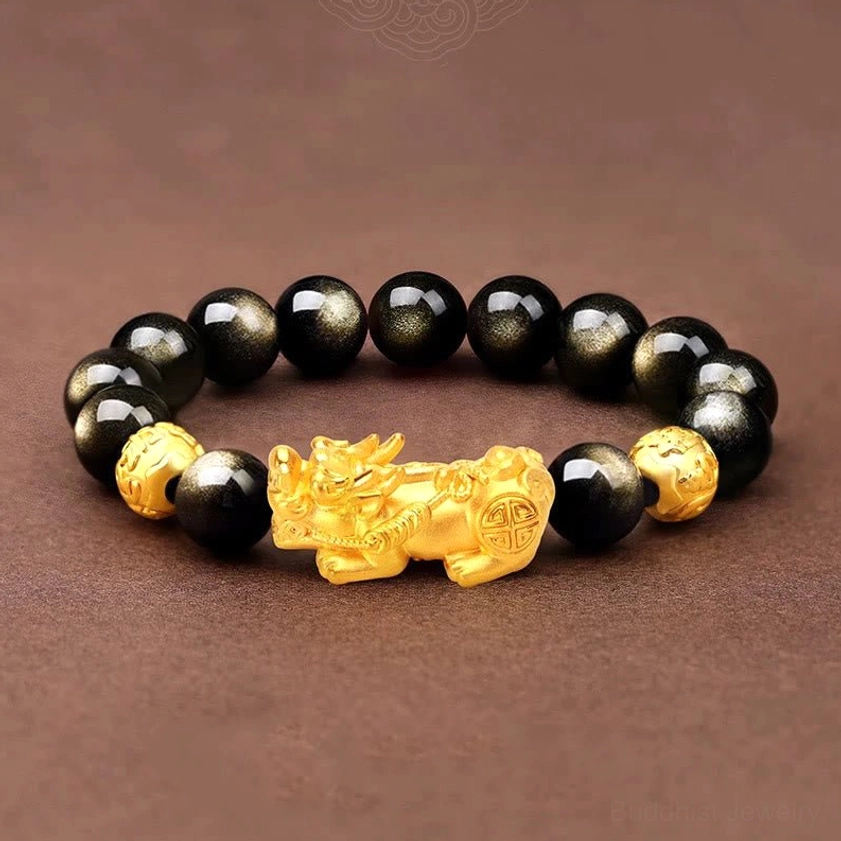 12mm gold sheen obsidian Pixiu bracelet for 16-17cm wrist circumference showing elastic cord and detailed beadwork