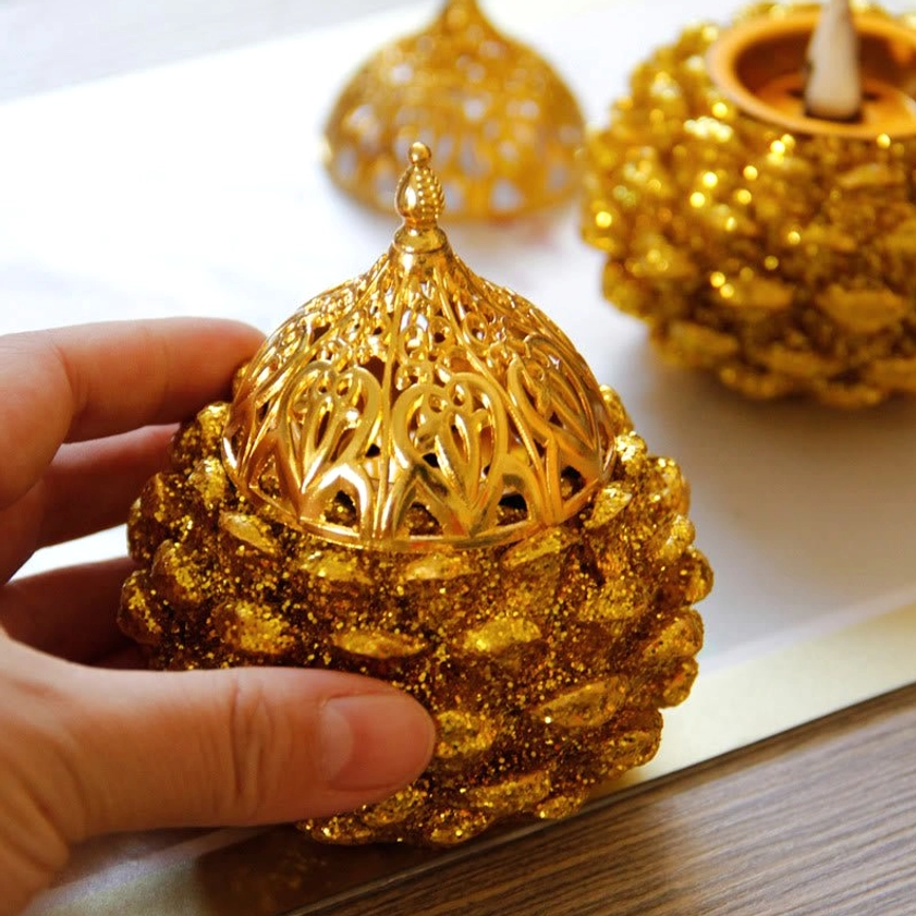 Gold pine cone incense burner's removable ventilation system and precision-engineered airflow design