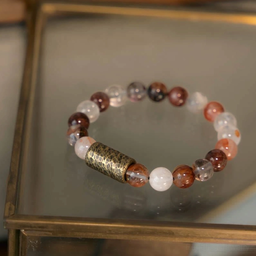 Gold rutilated quartz bracelet with shimmering golden needle inclusions for spiritual illumination