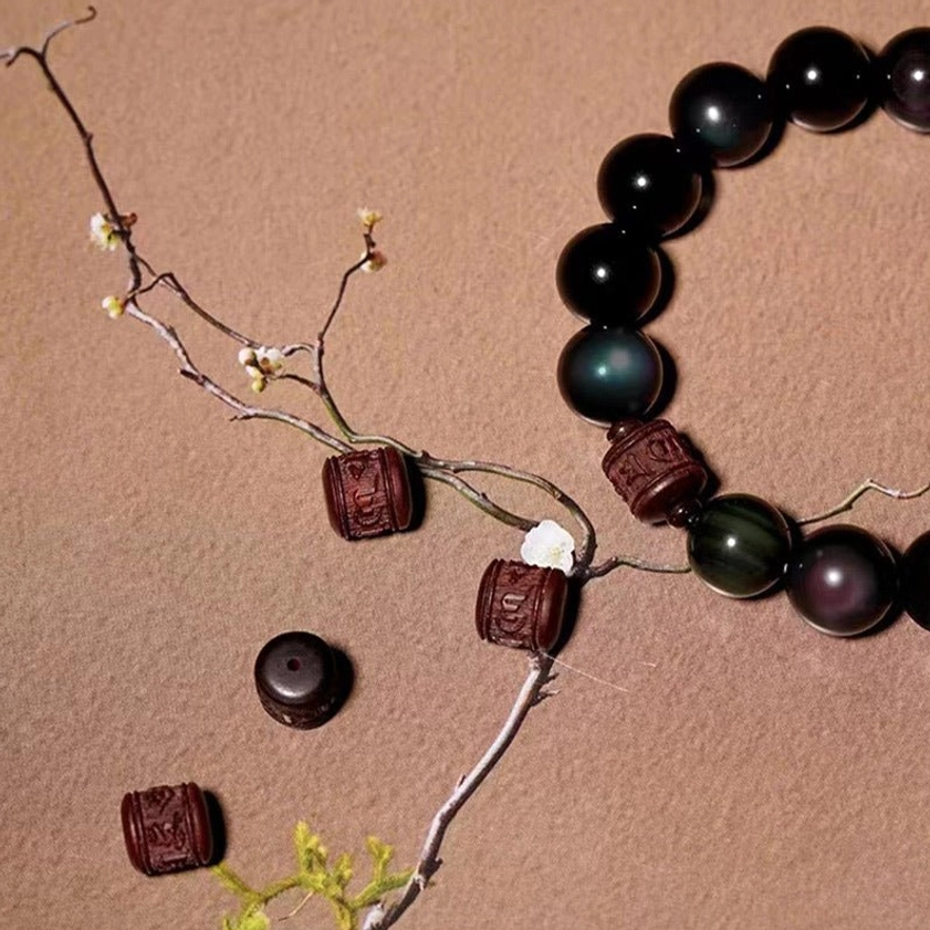 Gold sheen and black obsidian mixed beads bracelet with carved focal bead for spiritual balance and grounding