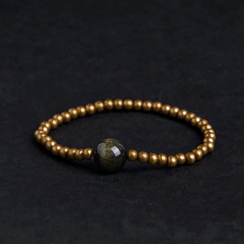 Gold Sheen Obsidian Copper Brass Buddhist bracelet top view flat lay with large obsidian center stone