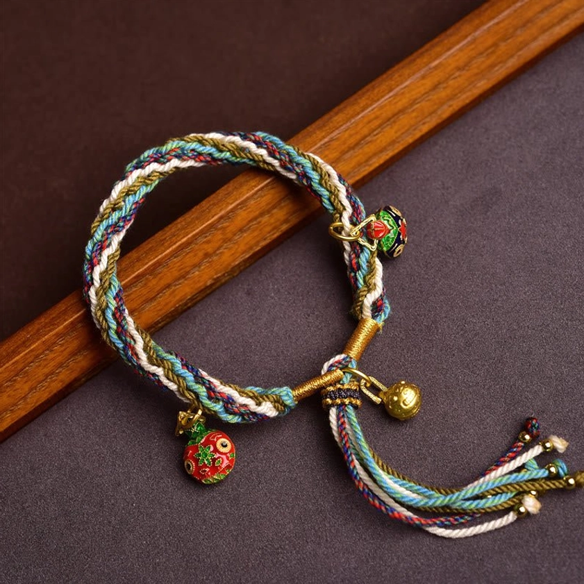 Gold Swallowing Beast family bracelet handmade Buddhist protection knot braid with three enamel charms and gold bell