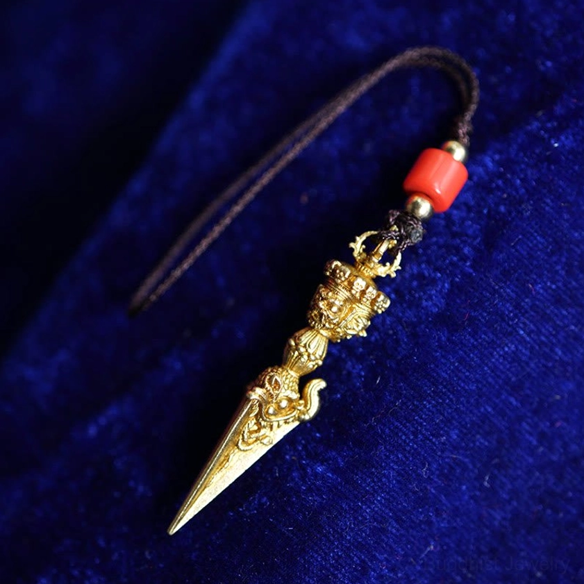 Gold finish vajra dorje pendant amulet with sacred carvings detailed product view