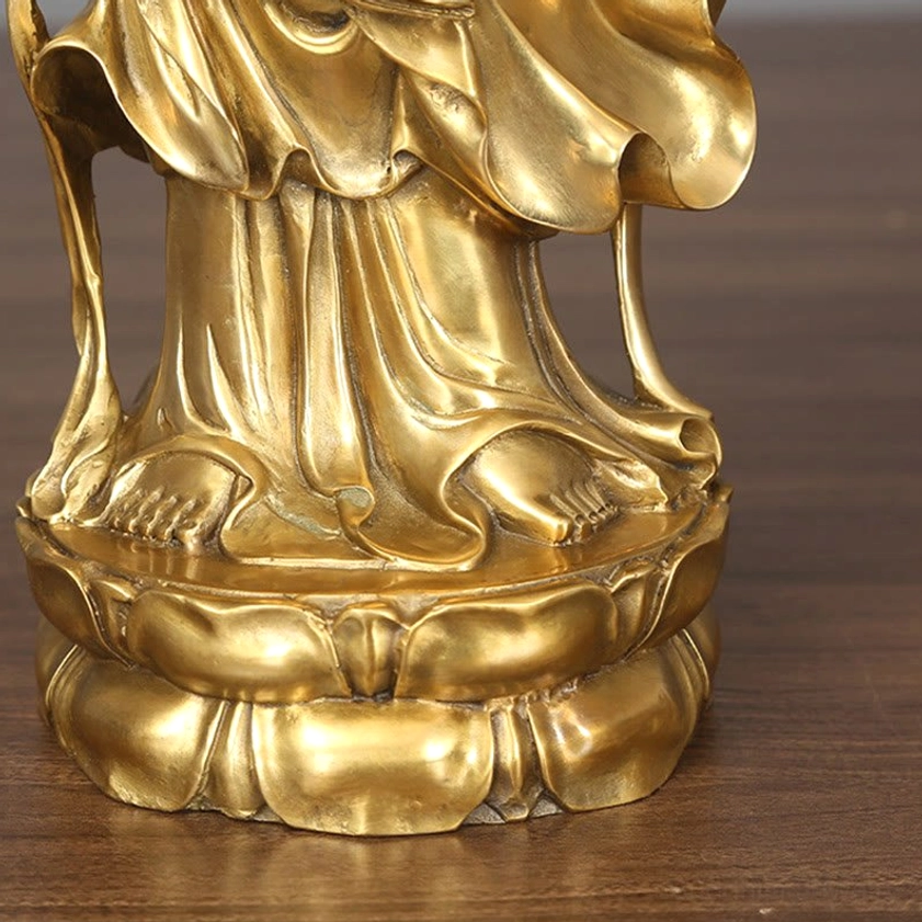 Handcrafted golden Avalokitesvara Bodhisattva statue full figure on lotus base, complete view for home altar decoration
