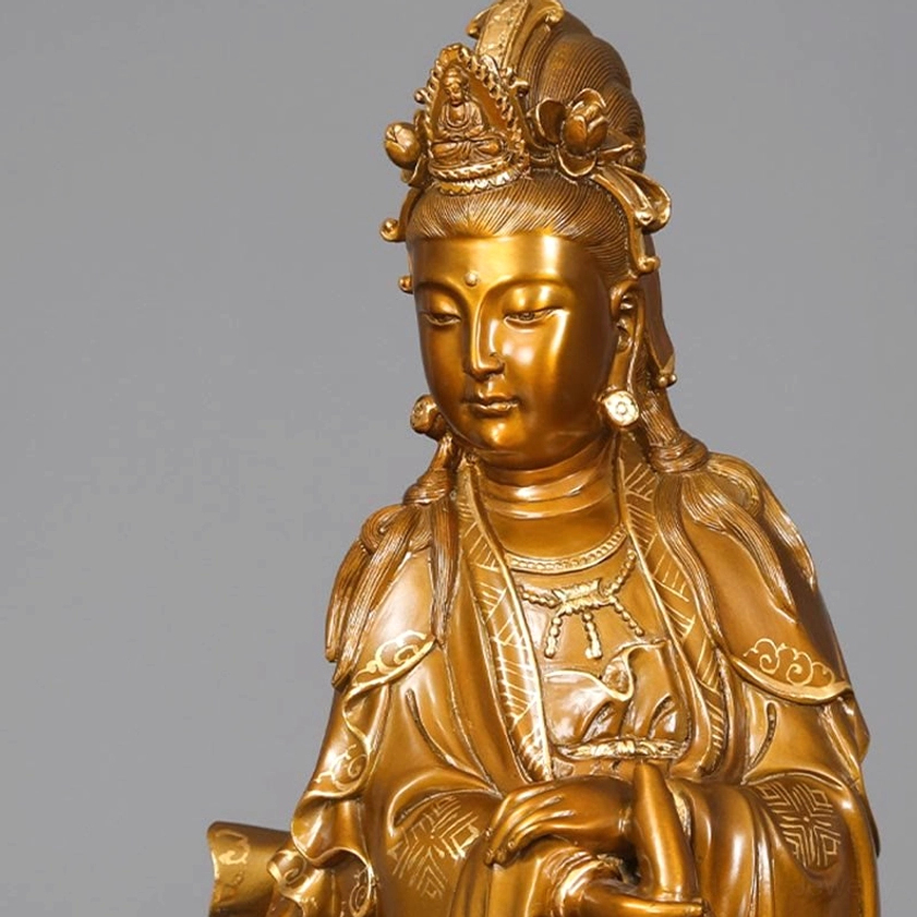 Warm golden-bronze Avalokitesvara statue with flowing robes and sacred vase, showcasing premium copper and brass craftsmanship