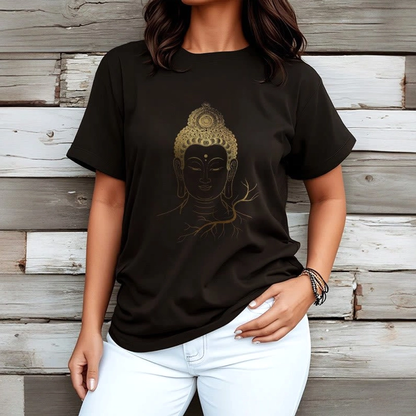 Female model wearing golden Buddha head t-shirt - casual street style with wooden background