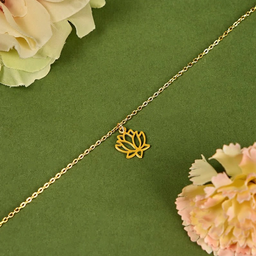 Gold lotus titanium steel bracelet worn on wrist showing comfortable adjustable fit