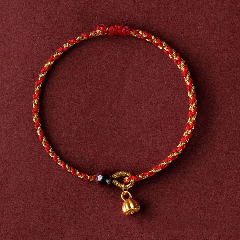 Golden lotus pod charm bracelet in red gold braid with adjustable closure