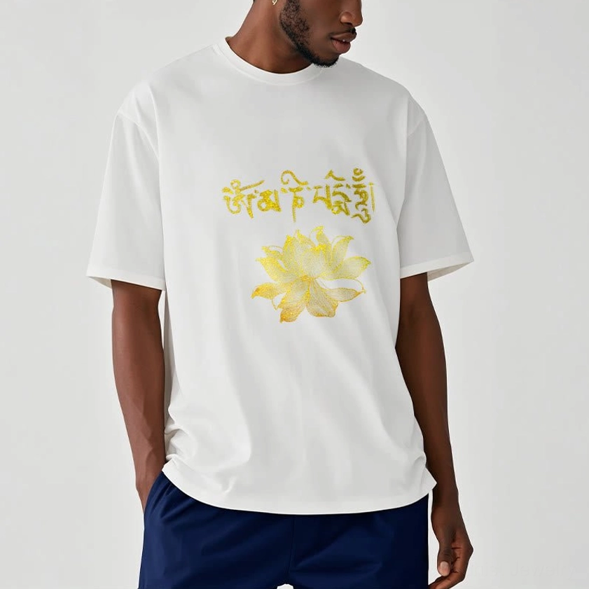 Model wearing white Buddhist graphic t-shirt with golden Sanskrit mantra print paired with navy pants - spiritual fashion styling