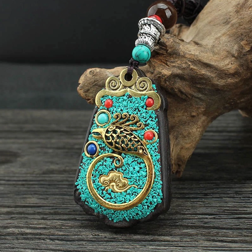 Golden Phoenix Buddhist thangka pendant - prosperity abundance wealth symbol