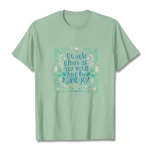 Sage green Buddhist golden rule graphic tee laid flat on white background showing front design with floral spiritual print