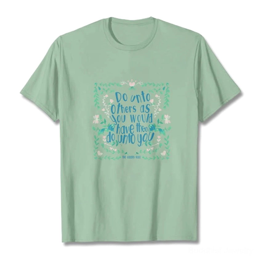 Sage green Buddhist golden rule graphic tee laid flat on white background showing front design with floral spiritual print