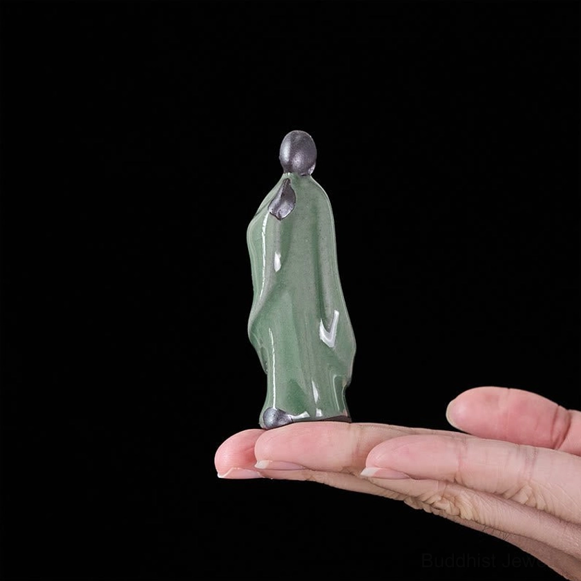 Gray meditation monk ceramic figurine hand-sculpted peaceful expression detail