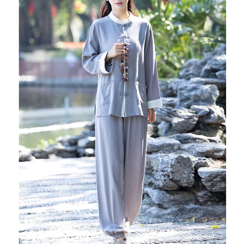 Gray zen meditation two-piece set with prayer beads, front full-body view in outdoor garden setting