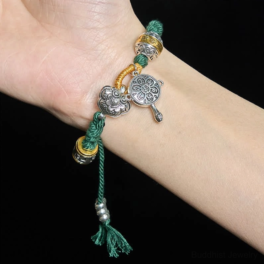 Green Braided Buddhist Bracelet Tassel and Metal Ornaments