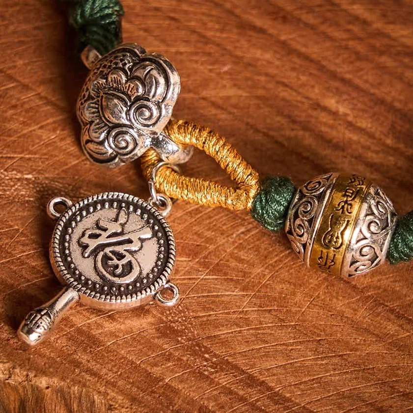 Green Buddhist Braided Bracelet Silver Charms and Rope Texture