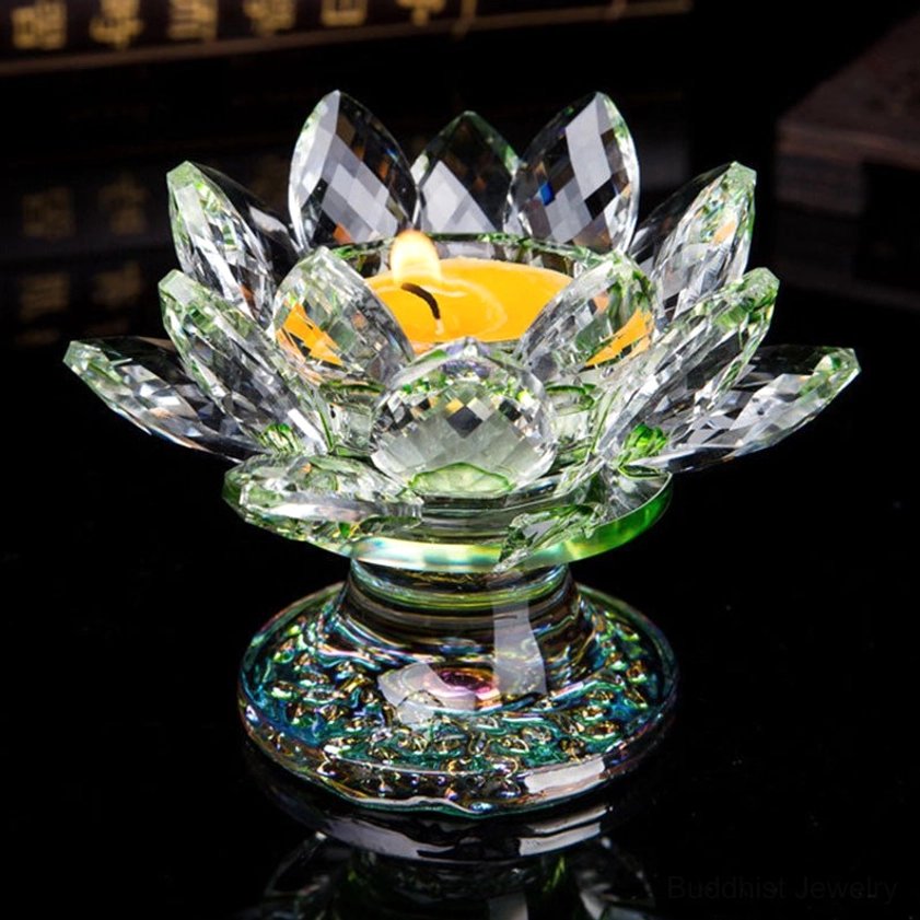 Green crystal lotus candleholder with faceted petals and iridescent patterned base - three-quarter perspective