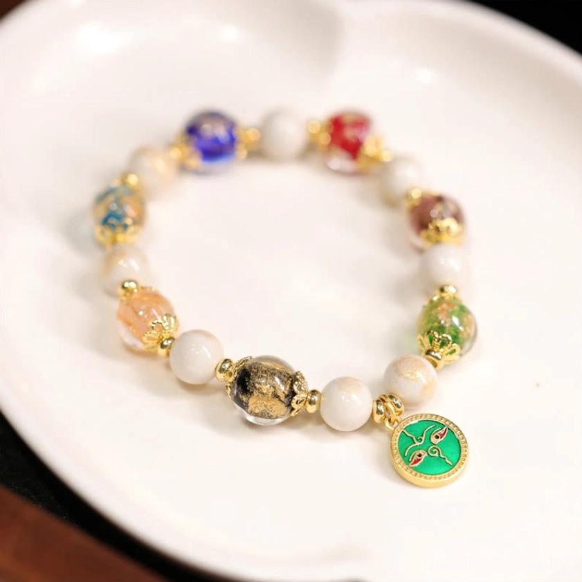 Green God of Wealth Buddhist bracelet with green enamel face pendant, mixed colorful beads and white incense ash porcelain
