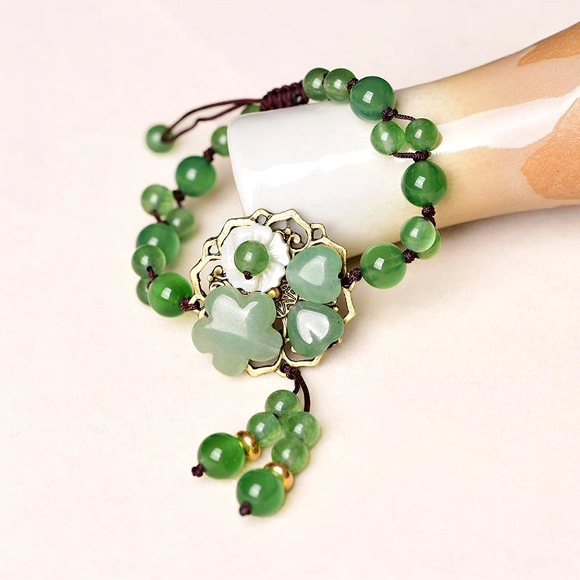 Flower Love green jade bracelet variant with delicate jade flower charm and heart-shaped pendant detail